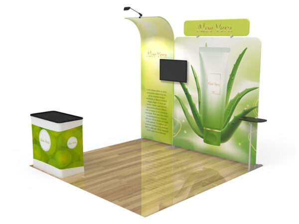 Green trade show booth shown.