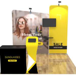 Yellow trade show display with iPad and tv shown.