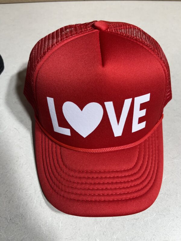 One of a kind foam trucker hat red hat with white dtf word love.