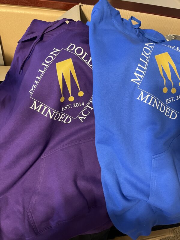 Purple and royal hooded sweatshirts shown.